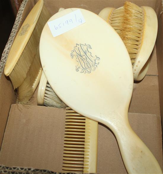 8 ivory backed brushes, comb etc.